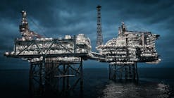 oil and gas platform offshore at night