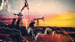 Oil pumpjacks at sunset with financial charts overlay depicting market trends. Concept of oil economy, stock market, and trade fluctuations
